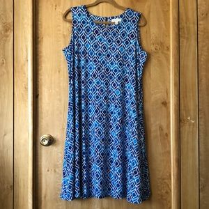 Women’s dress. 40”length. Polyester and spandex.